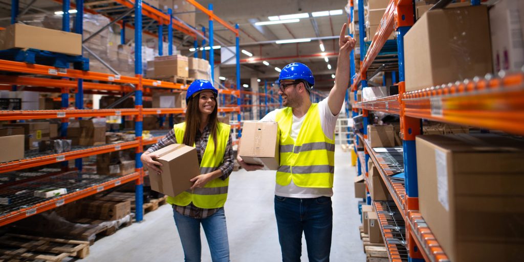 workers-carrying-boxes-relocating-items-large-warehouse-center